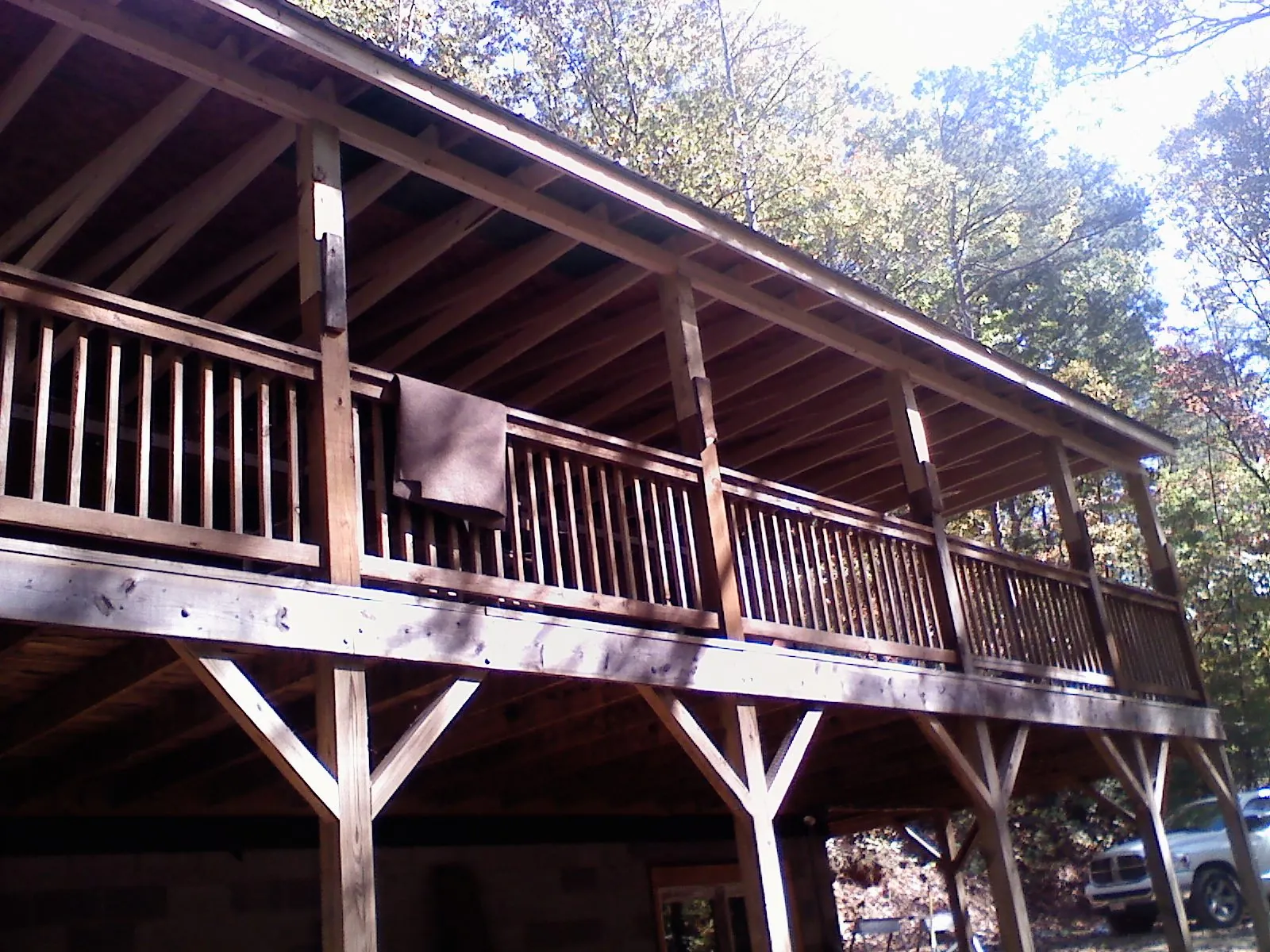 Timber framing under a new elevated porch and deck — Roof Leak Repair in Half Moon Bay by Roofing Brothers